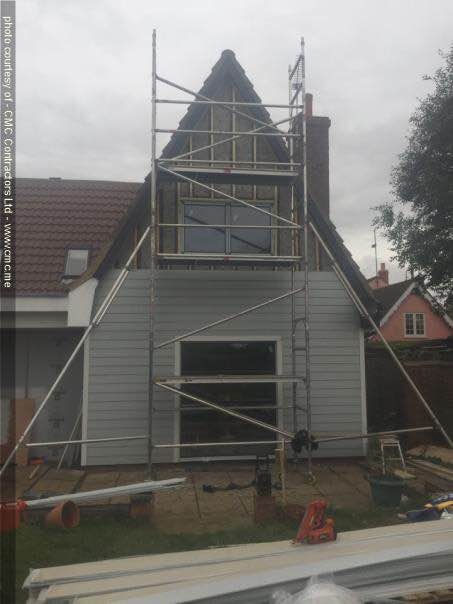 Extension under construction — scaffolding on gable end, Suffolk