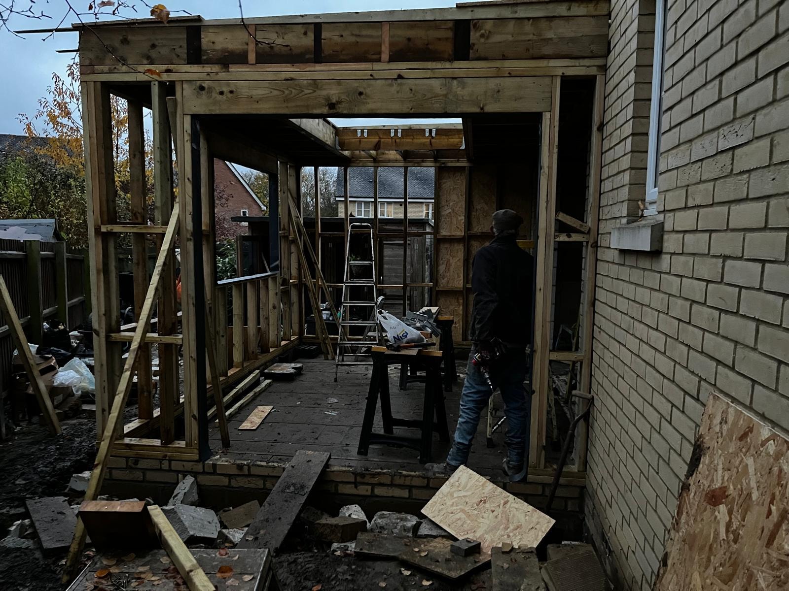 Extension in progress — timber frame and roof structure