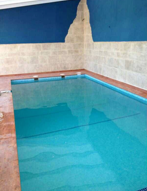 Completed swimming pool with turquoise water
